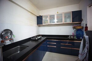 Kitchen in 2 BHK Apartment at Charholi Budruk – for Sale