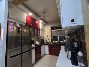 Kitchen in 2 BHK Apartment at Pride Presidency Luxuria, Ghodbunder Road – for Sale