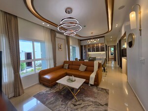 Living Room in 4 BHK Apartment at Abhee Aaria, Gunjur – for Sale