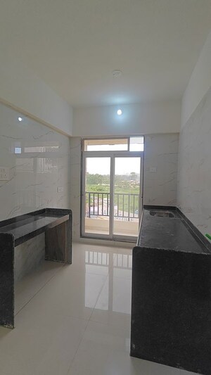 Kitchen in 1 BHK Apartment at Maanit Gokuldham, Dwarli Gaon – for Sale