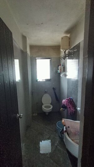 Bathroom in 2 BHK Apartment at Sudarshan Sky Garden, Ghodbunder Road – for Rent