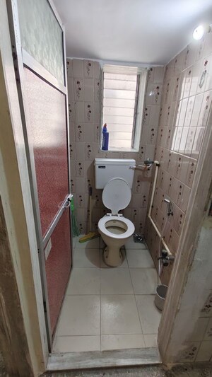Bathroom in 1 BHK Apartment at Unity Apartment, Bafhira Nagar – for Rent