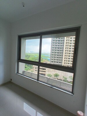 Room in 2 BHK Apartment at Kalpataru Immensa D, Kolshet Road – for Sale