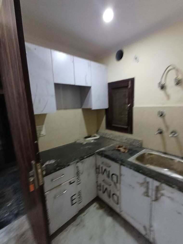 Kitchen, molarband 6 Bedroom 85 Sq.Yd. Independent House In Molarband Delhi 10680464