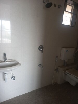 Bathroom in 1 BHK Apartment at Colo Color Rise, Dadar West – for Sale