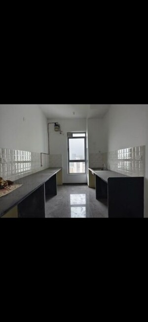 Kitchen in 3 BHK Apartment at Kalpataru Immensa, Kolshet Road – for Rent