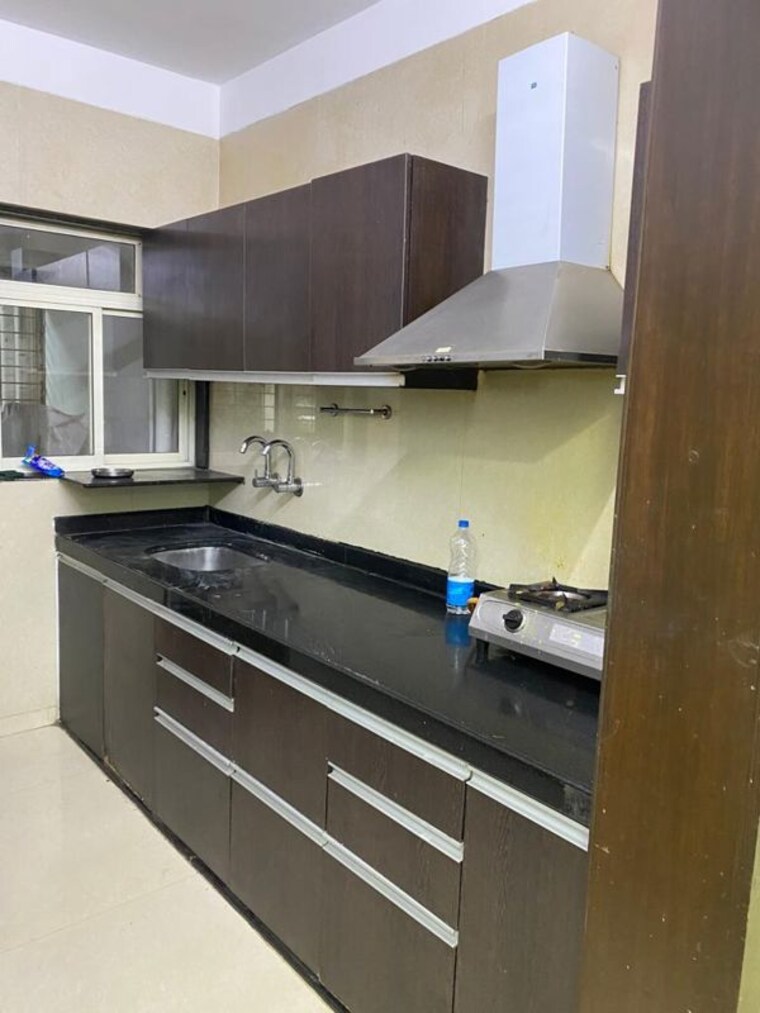 Kitchen, gini-viviana 2.5 Bedroom 935 Sq.Ft. Apartment In Balewadi Pune 10680491