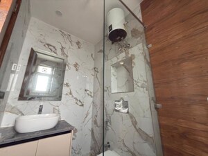 Bathroom in 4 BHK Apartment at Adani Samsara Vilasa, Sector 63 – for Rent