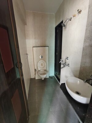 Bathroom in 1 BHK Apartment at Vihang Valley Phase 3, Kasarvadavali – for Rent