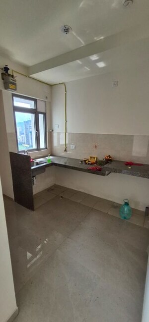 Kitchen in 1 BHK Apartment at Piramal Vaikunth, Balkum Pada – for Rent