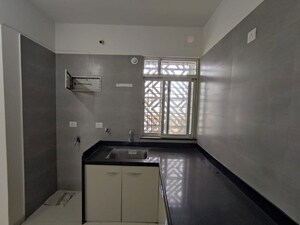 Kitchen in 2 BHK Apartment at Kohinoor Coral Phase 3, Hinjewadi – for Rent