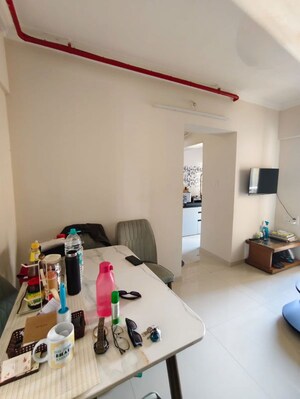 Living Room in 1 BHK Apartment at Raunak Bliss, Ghodbunder Road – for Rent