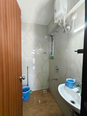 Bathroom in 1 BHK Apartment at Raunak Bliss, Ghodbunder Road – for Rent