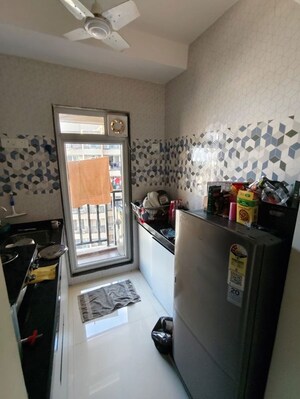 Kitchen in 1 BHK Apartment at Raunak Bliss, Ghodbunder Road – for Rent