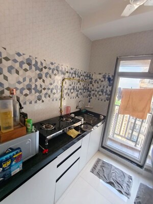 Kitchen in 1 BHK Apartment at Raunak Bliss, Ghodbunder Road – for Rent