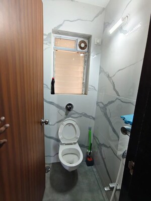 Bathroom in 1 BHK Apartment at Raunak Bliss, Ghodbunder Road – for Rent