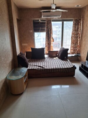 Living Room in 1 BHK Apartment at Pegasus Tower, Andheri West – for Sale