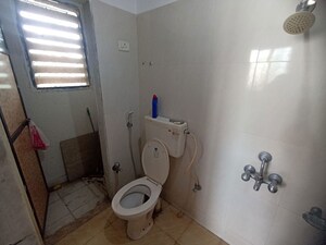 Bathroom in 2 BHK Apartment at Pushpanjali Heights, Owale – for Rent