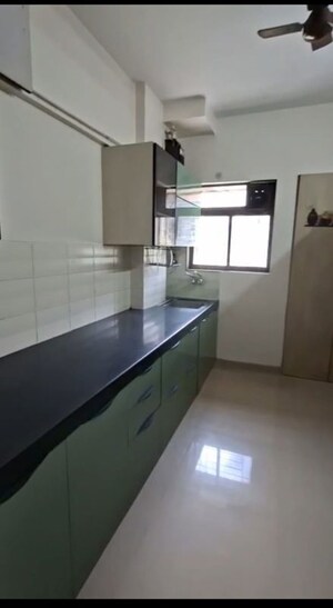 Kitchen in 2 BHK Apartment at Vijay Garden, Ghodbunder Road – for Rent