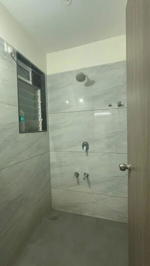Bathroom in 1 BHK Apartment at Metropolis Bayside, Kasarvadavali – for Sale