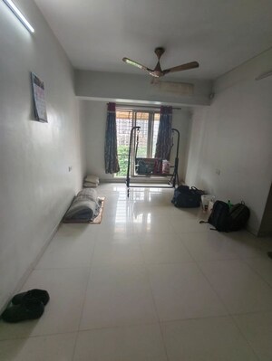 Living Room in 1 BHK Apartment at Rosa Classique, Kasarvadavali – for Rent