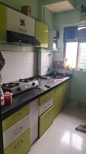 Kitchen in 1 BHK Apartment at Rosa Classique, Kasarvadavali – for Rent