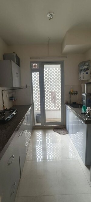 Kitchen in 2 BHK Apartment at Piramal Vaikunth, Balkum Pada – for Rent