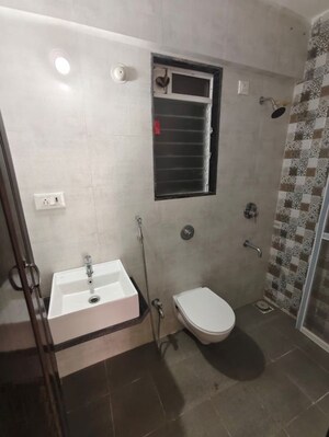 Bathroom in 1 BHK Apartment at Vihang Valley Phase 3, Kasarvadavali – for Rent