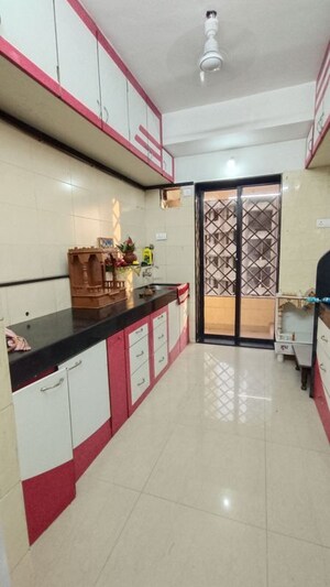 Kitchen in 3 BHK Apartment at Swapnalok Towers, Malad East – for Rent
