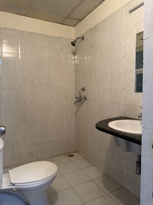 Bathroom in 3 BHK Apartment at Mapsko Paradise, Sector 83 – for Rent