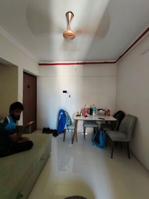 Living Room in 1 BHK Apartment at Raunak Bliss, Ghodbunder Road – for Rent
