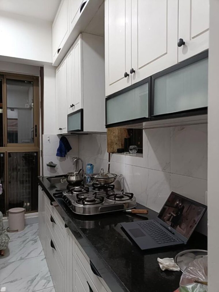 Kitchen, raymond-ten-x-vibes 2 Bedroom 665 Sq.Ft. Apartment In J K Gram Thane 10680696
