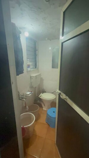 Bathroom in 1 BHK Apartment at Krishna Greenland Park Vastu Federation, Ghodbunder Road – for Sale