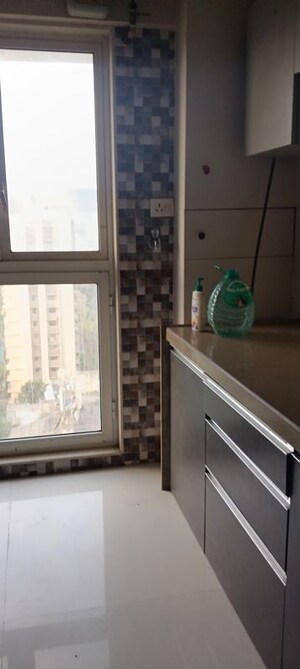 Kitchen in 2 BHK Apartment at Kabra Metro One, Andheri West – for Rent