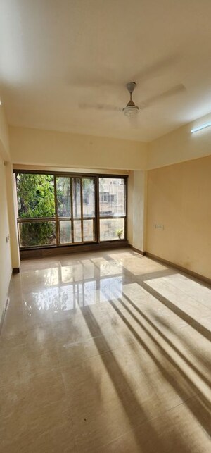 Room in 2 BHK Apartment at Navneet Apartment, Andheri West – for Rent