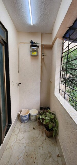 Building Lobby in 2 BHK Apartment at Navneet Apartment, Andheri West – for Rent