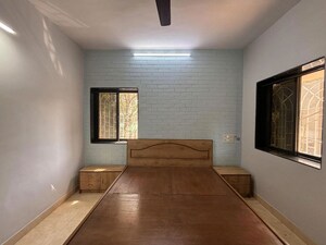Living Room in 2 BHK Apartment at Juhu Darshan CHS, Andheri West – for Rent