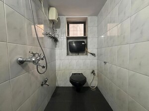 Bathroom in 2 BHK Apartment at Juhu Darshan CHS, Andheri West – for Rent