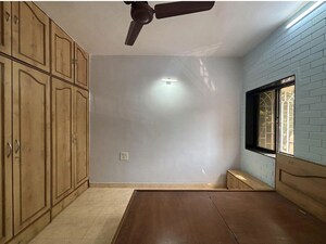 Bedroom in 2 BHK Apartment at Juhu Darshan CHS, Andheri West – for Rent