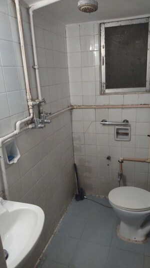 Bathroom in 2 BHK Apartment at Vile Parle West – for Rent