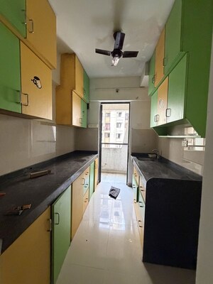 Kitchen in 1 BHK Apartment at Lodha Lakeshore Greens, Dombivli East – for Rent