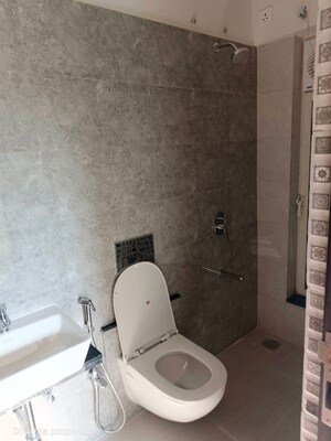 Bathroom in 1 BHK Apartment at Omkar Signet, Malad East – for Rent