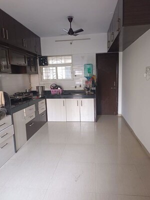 Kitchen in 2 BHK Apartment at Gulmohar Queenstown, Kharadi – for Sale