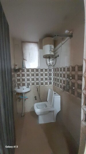 Bathroom in 1 RK Apartment at Mahindra Aura, Sector 110a – for Rent