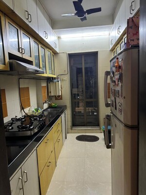 Kitchen in 2 BHK Apartment at Etco Eco Heights, Andheri East – for Rent