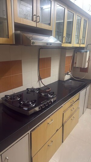 Kitchen in 2 BHK Apartment at Etco Eco Heights, Andheri East – for Rent