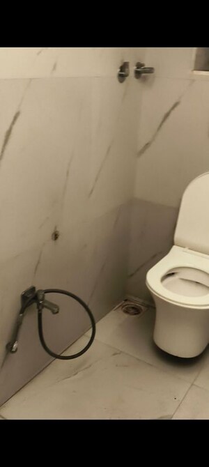 Bathroom in 1 RK Apartment at Snow White CHS, Vile Parle East – for Rent