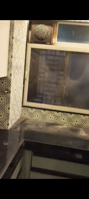 Bedroom in 1 RK Apartment at Snow White CHS, Vile Parle East – for Rent