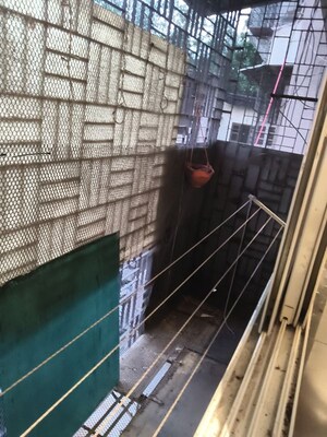 Balcony in 1 RK Apartment at Snow White CHS, Vile Parle East – for Rent