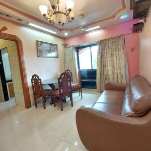 Living Room in 1 BHK Apartment at Satellite Garden, Goregaon East – for Rent